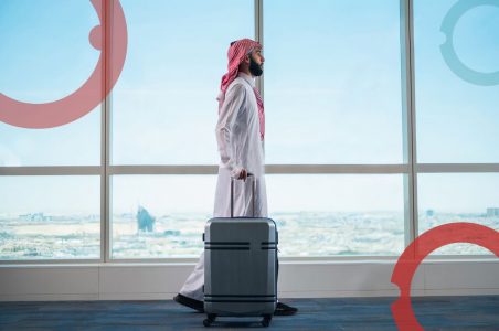 دمج مجموعات السفر تحت علامة المسافر